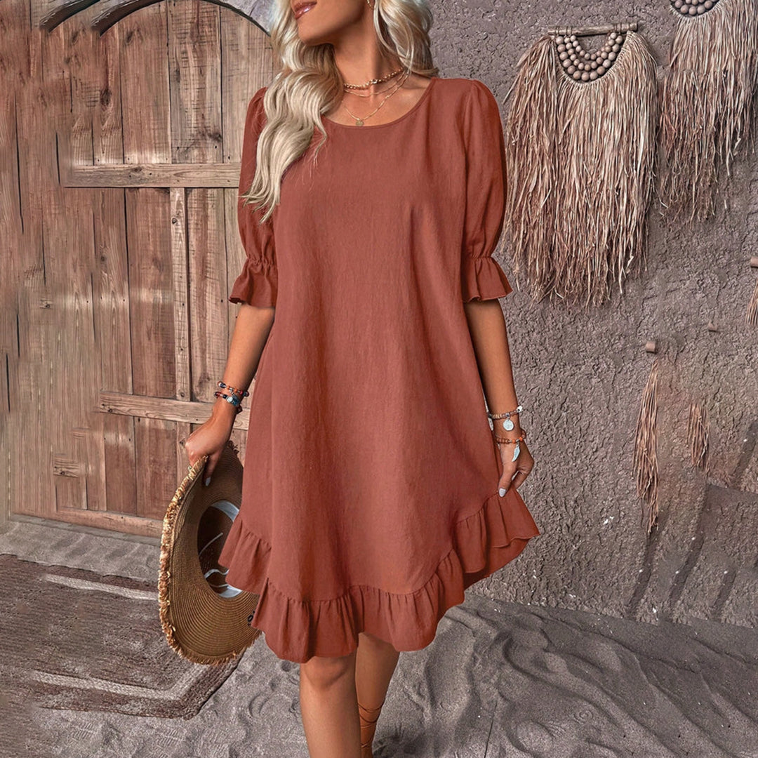 Julia's Elegantes Schwarzes Kleid mit Puffärmeln