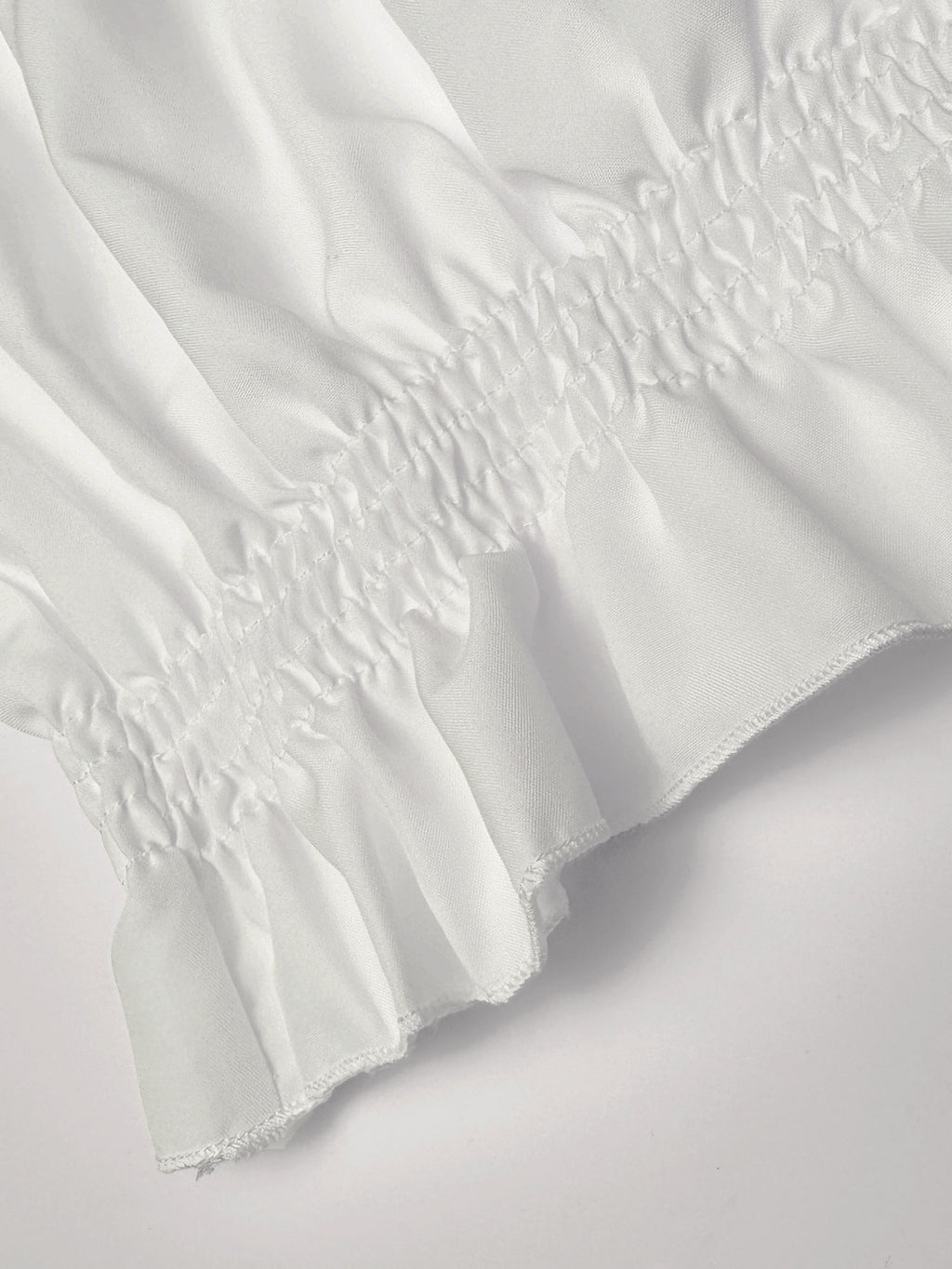 Weiße Rüschenbluse mit langen Ärmeln - Clara